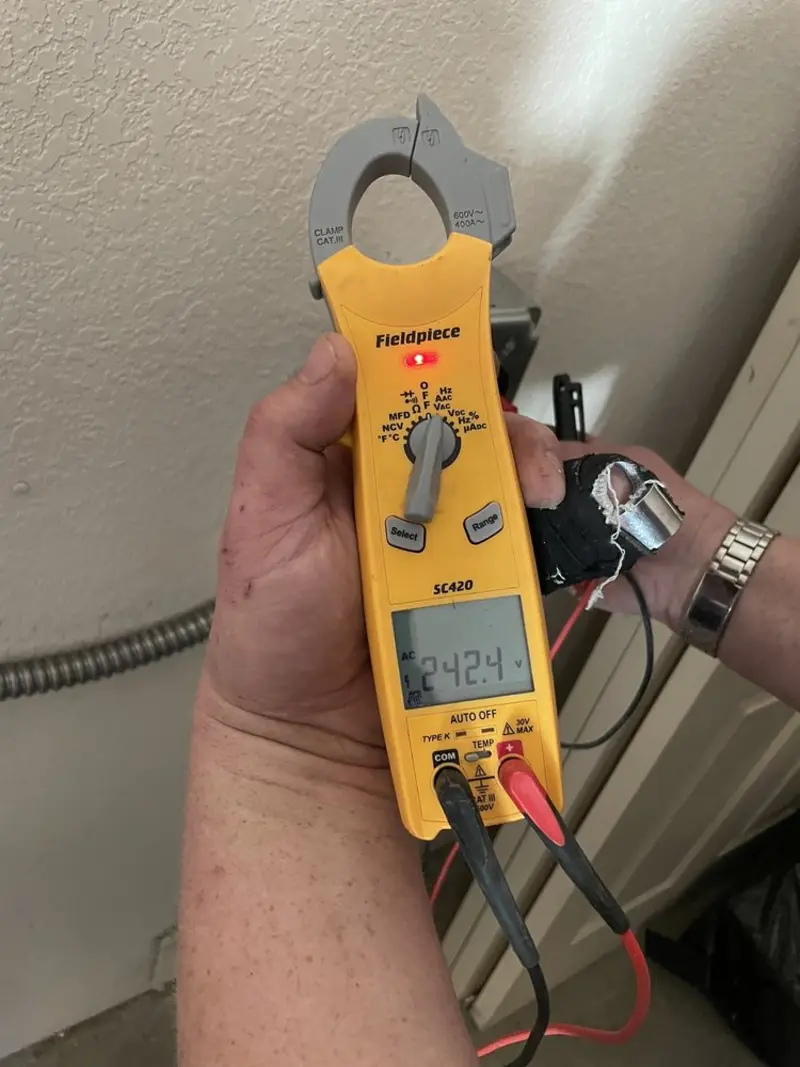 Voltage testing with clamp meter during Circuit Breaker Repair in Fairport Harbor